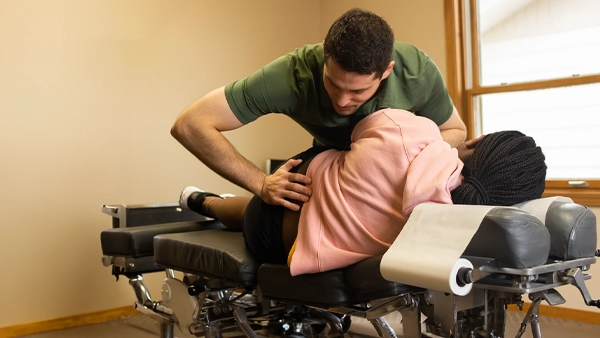 Chiropractor Sioux Center IA Drew Ebel Adjusting Patient